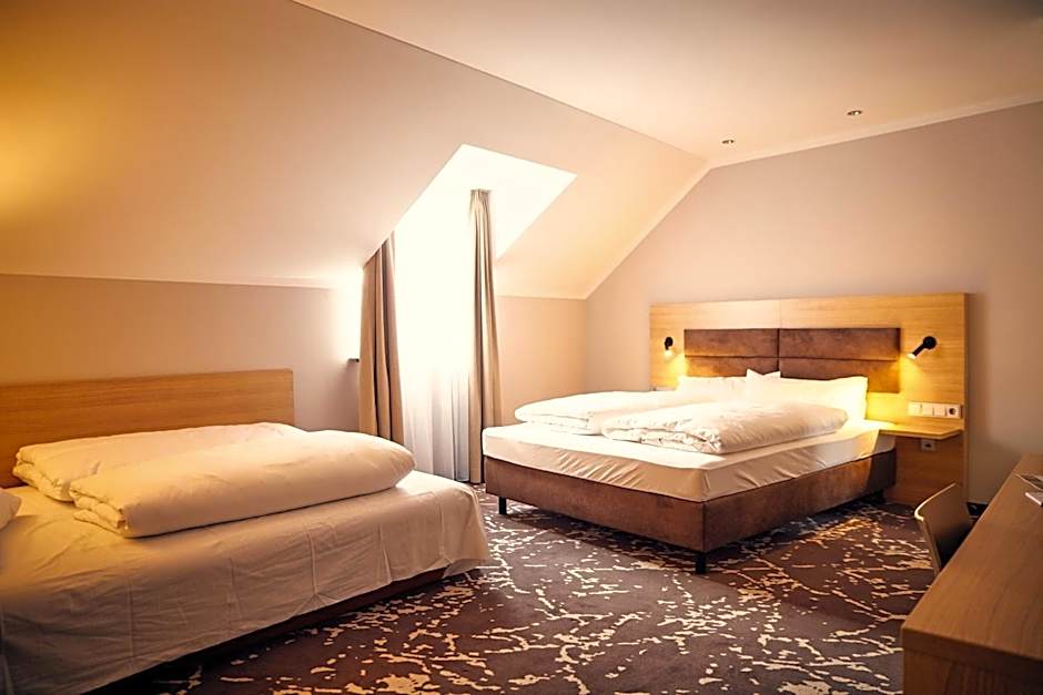 Photo 1 sur 5 de Quadruple Room