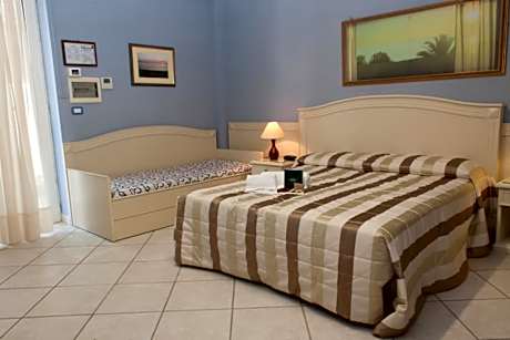 Triple Room (2 Adults + 1 Child)