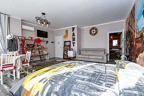 Deluxe Quadruple Room with Balcony