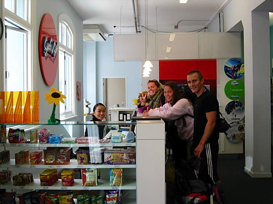 Surf 'N' Snow Backpackers Across Sky Tower