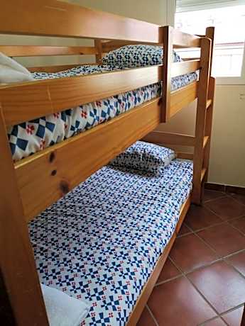Economy Quadruple Room with Shared Bathroom