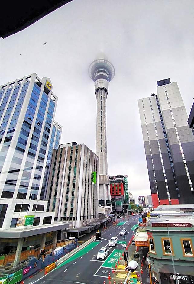 Surf 'N' Snow Backpackers Across Sky Tower