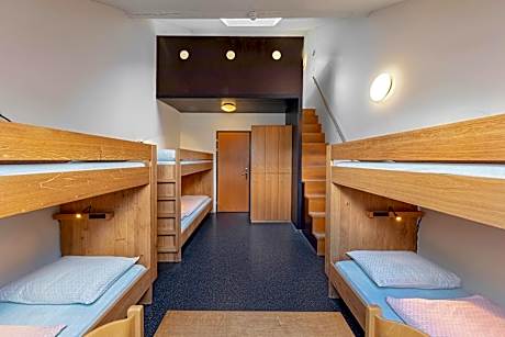 Single Bed in Dormitory Room