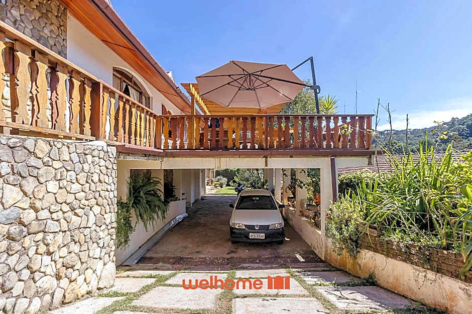 Casa em Campos do Jordão com Varanda e Lareira