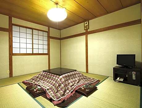 Quadruple Room with Shared Bathroom