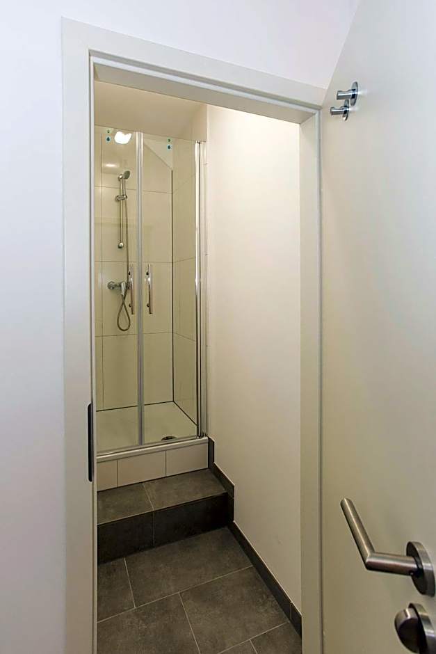 Zentral gelegene Zimmer mit Gemeinschaftsbad und Küche