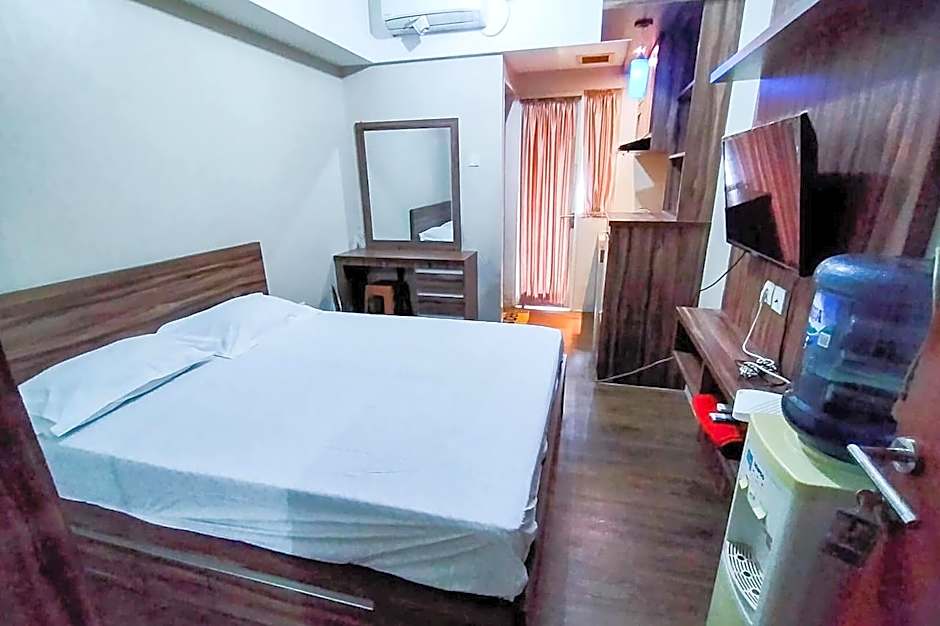 RedLiving Apartemen Green Lake View Ciputat - Juragan Rooms Tower B with Fast Wifi