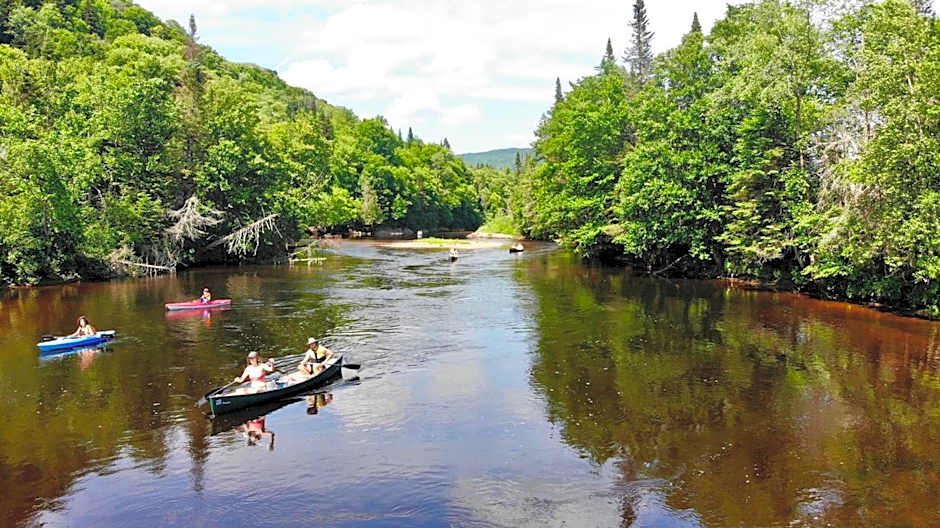 Tranquil Riverfront Chalet with Hot Tub