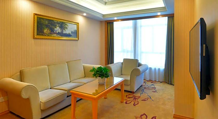 Vienna International Hotel Meizhou Spindle Bridge Branch