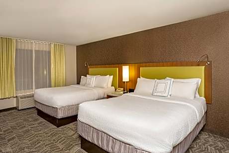 Queen Suite with Two Queen Beds and Sofa Bed