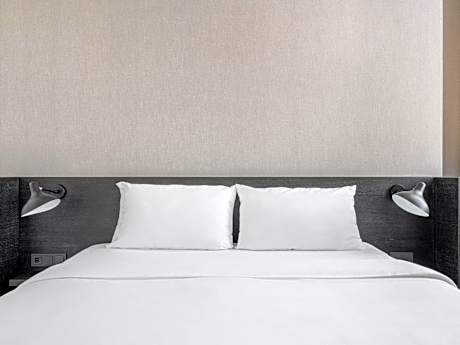 Extra Large Room with Separate Living Area and Bathtub