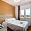 Hostal Jume - Urban Rooms