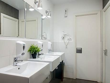 Bed in 4-Bed Female Dormitory Room with Shared Bathroom