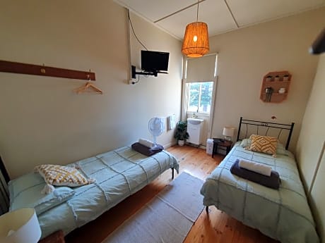 Basic Twin Room - Shared Bathrooms