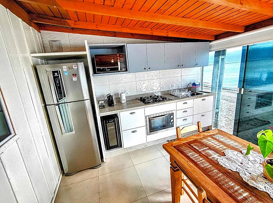 Casa charmosa pé na areia por do sol