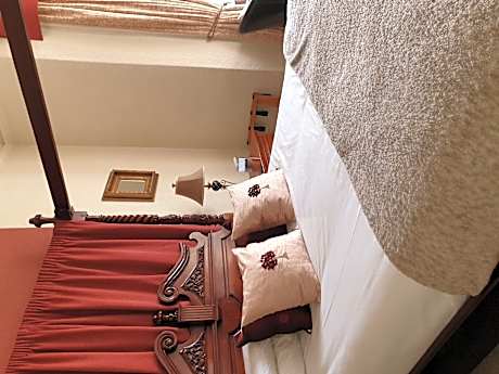 Room with Four-Poster Bed