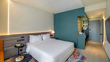 Premier King Room with Complimentary IMFL from 6:00 pm to 8 pm at Barcode and Shared Airport Transfer
