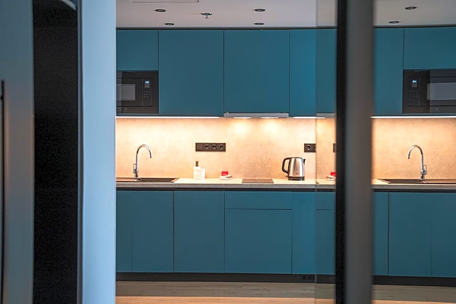 Escala Hotel & Suites