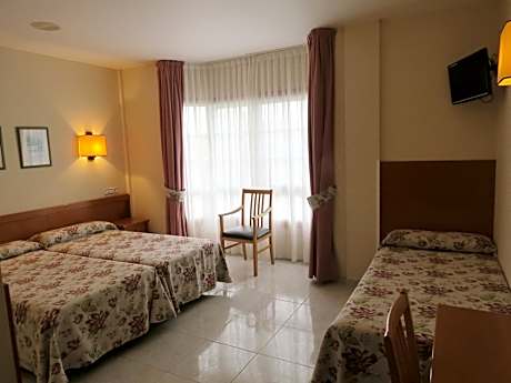 Triple Room (2 Adults + 1 Child)