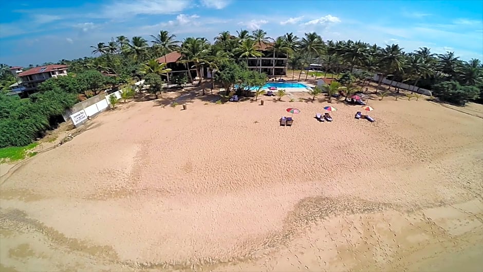 Whispering Palms Hotel