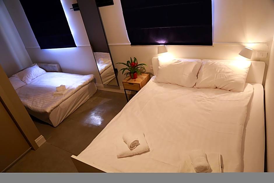 Photo 1 of 4 of Triple Room with Private Bathroom