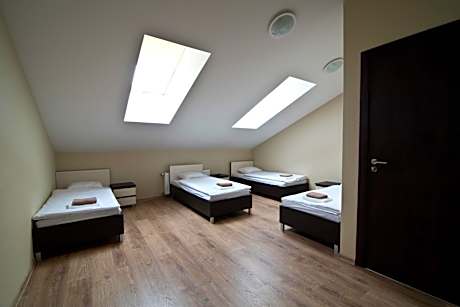 Quadruple Room with four single beds