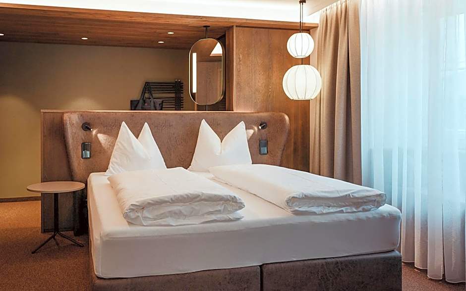 Österreichischer Hof-im Bademantel direkt in die Alpentherme