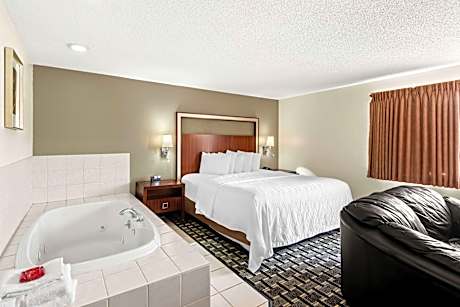 Suite-1 King Bed, Non-Smoking, Whirlpool, Sofabed, Flat Screen Television, Desk, Microwave And Refri