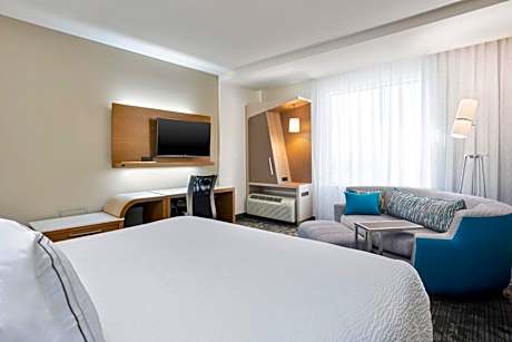 King Room with Sofa Bed and Roll-in Shower - Mobility and Hearing Accessible