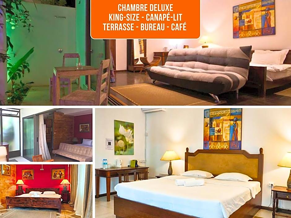 Villa Alizée - Boutique Hôtel Expérience - Idéal Couples & Pros - Piscine - Restaurant - Rooftop bar - Parking privé - 10min Port-Louis - Ambiance Tropical chic & authentique