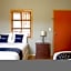 Capital O Hotel Villa Azura