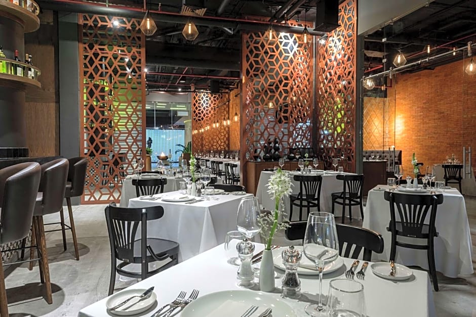 The Fives Downtown Hotel & Residences, Curio Collection by Hilton