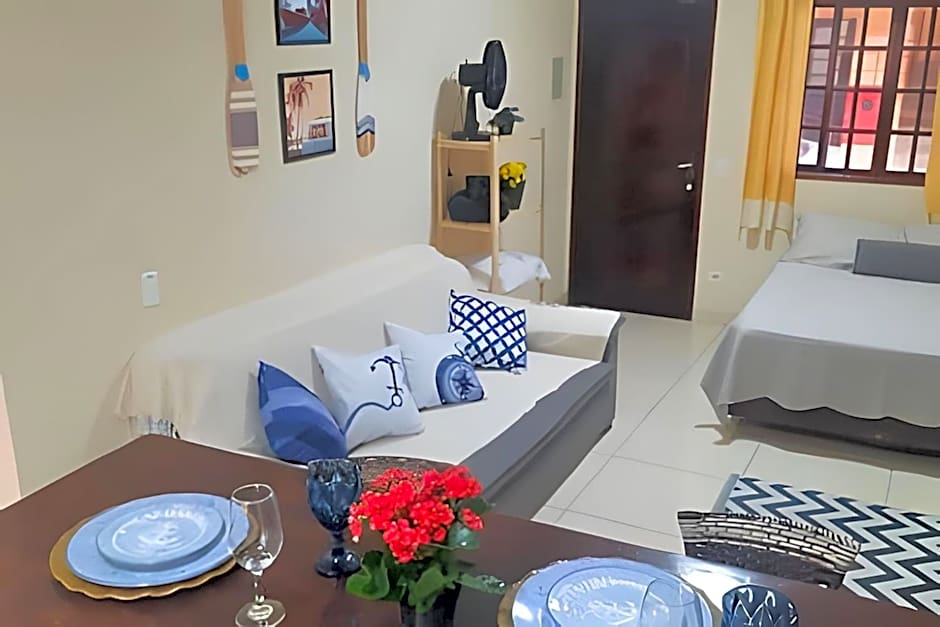 Studio pé na areia com área de churrasco privativa