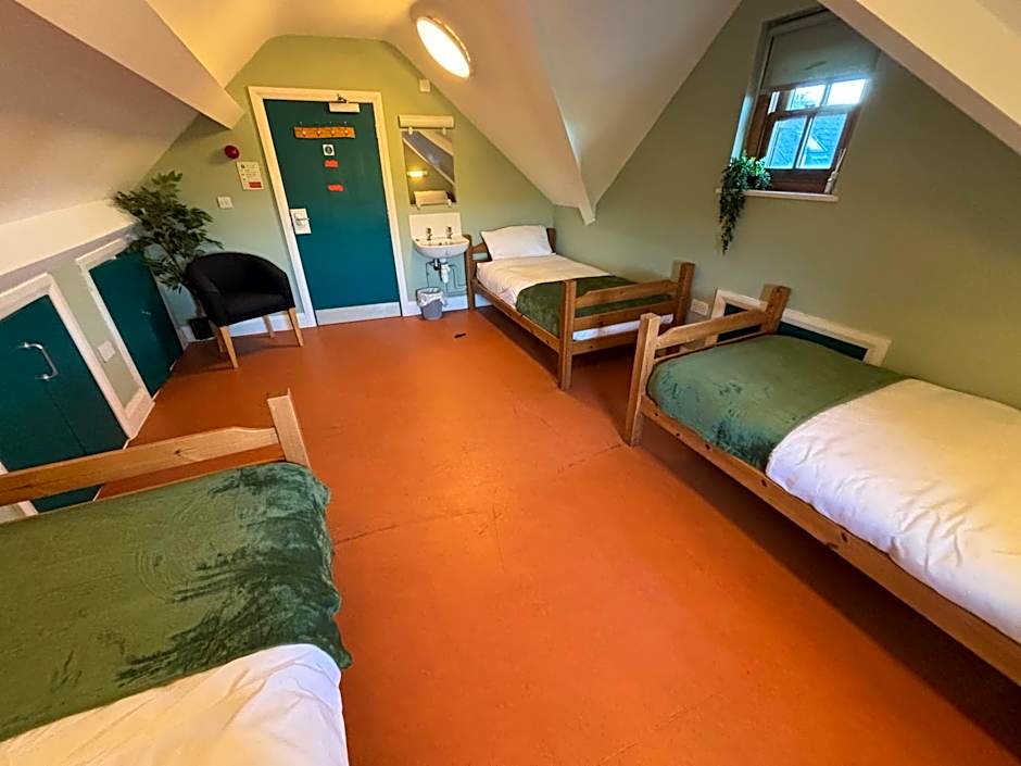 Photo 1 of 5 of Triple Room with Shared Bathroom
