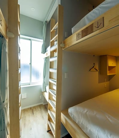 Single Bed in Dormitory Room