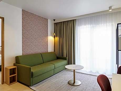 Double Suite with Balcony and One Double Sofa Bed