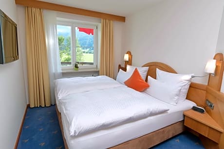 Suite-1 Double Bed, Mountain View, Separate Living Room, Balcony, Flat Screen Television, Mini Bar, 