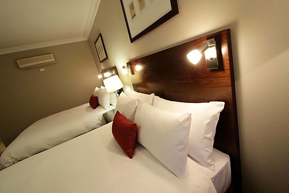 Carlyle Suites & Apartments