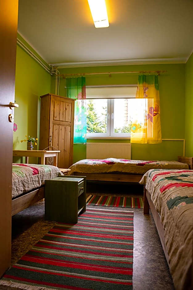Photo 1 of 3 of Triple Room with Shared Bathroom
