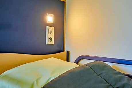 Single Bed in Male Dormitory Room