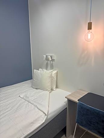 Economy Double Room With Shared Bathroom (No Window - 55 in Bed)