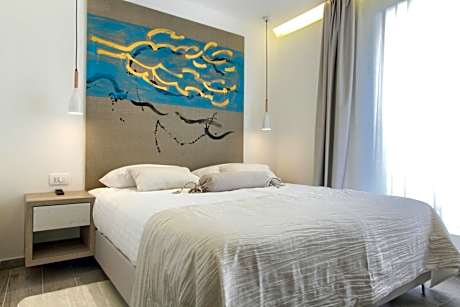 Deluxe Two-Bedroom Suite with Balcony and Sea View