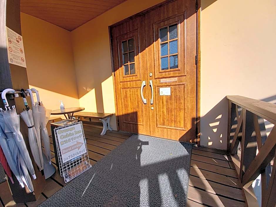 Orange Cabin Inn far from station