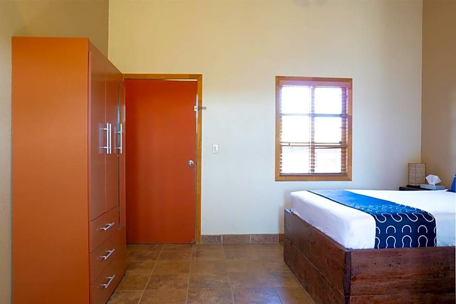 Capital O Hotel Villa Azura
