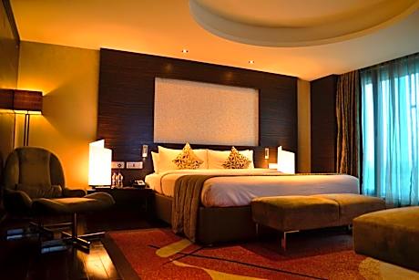 Presidential Suite - King Bed with 1+1 on Beers/IMFL from 6 PM till 8 PM