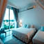 White Wall Riverfront Hotel