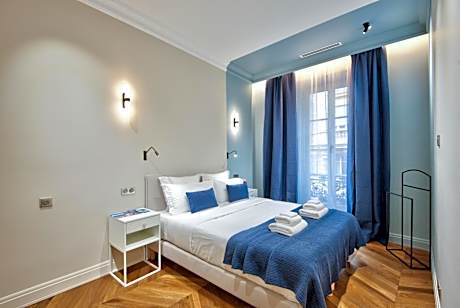 One-Bedroom Apartment with Balcony and City View