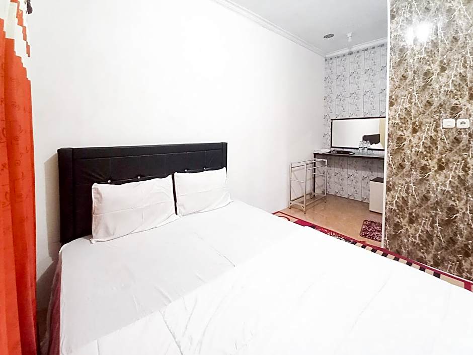 Lancar Homestay Syariah near BNS Mitra RedDoorz