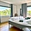 Comfortable guest rooms with fully equipped kitchen and cosy living room.