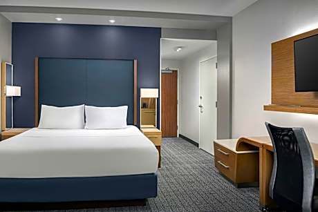 King Room with Sofa Bed and Roll-in Shower - Mobility and Hearing Accessible